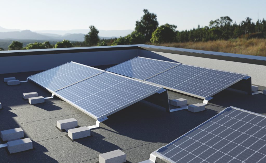 REKOSOLAR ballasted mounting system carrying solar modules on a flat commercial roof